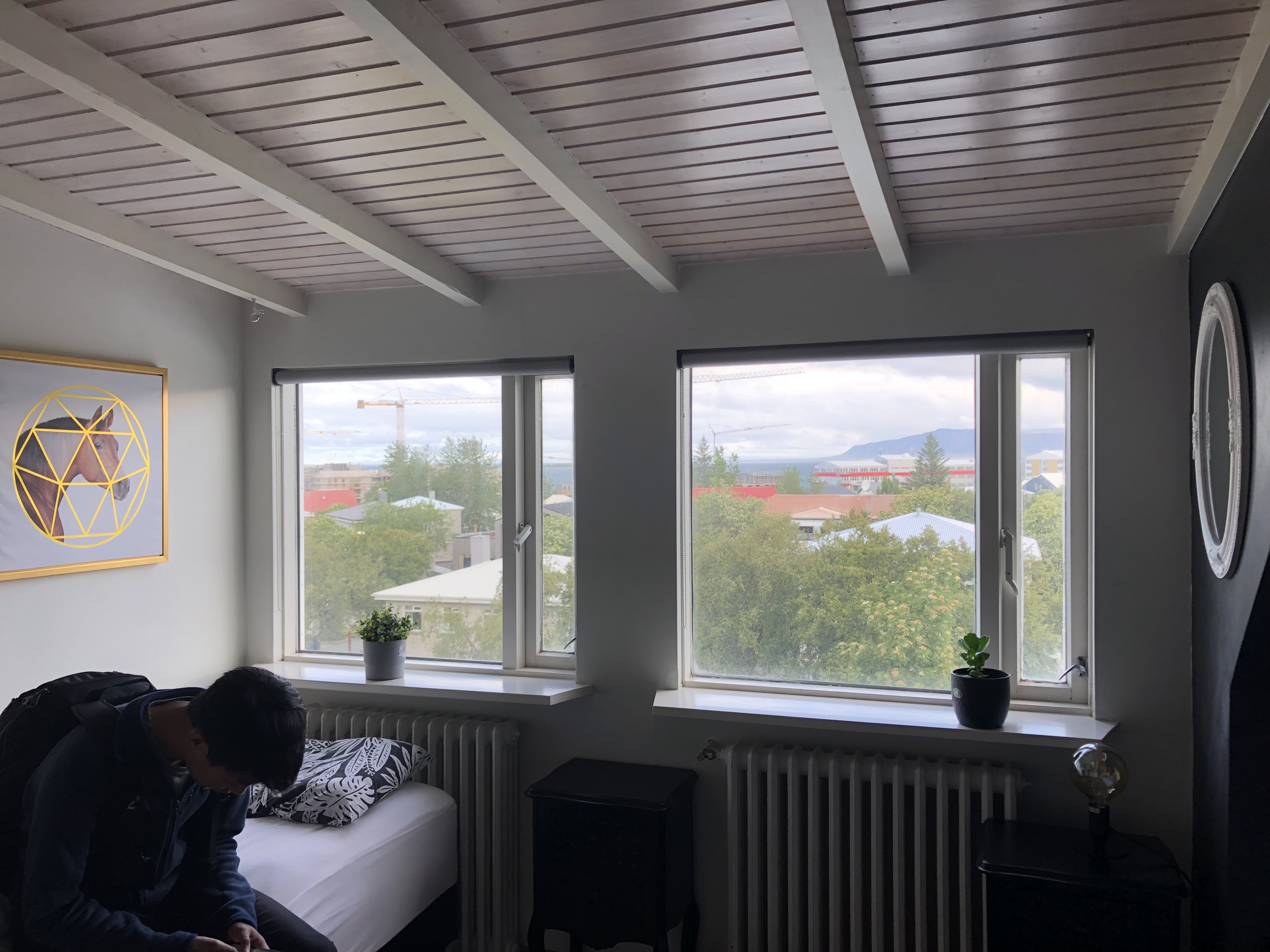 Room with a view of the mountains and ocean in Reykjavik.