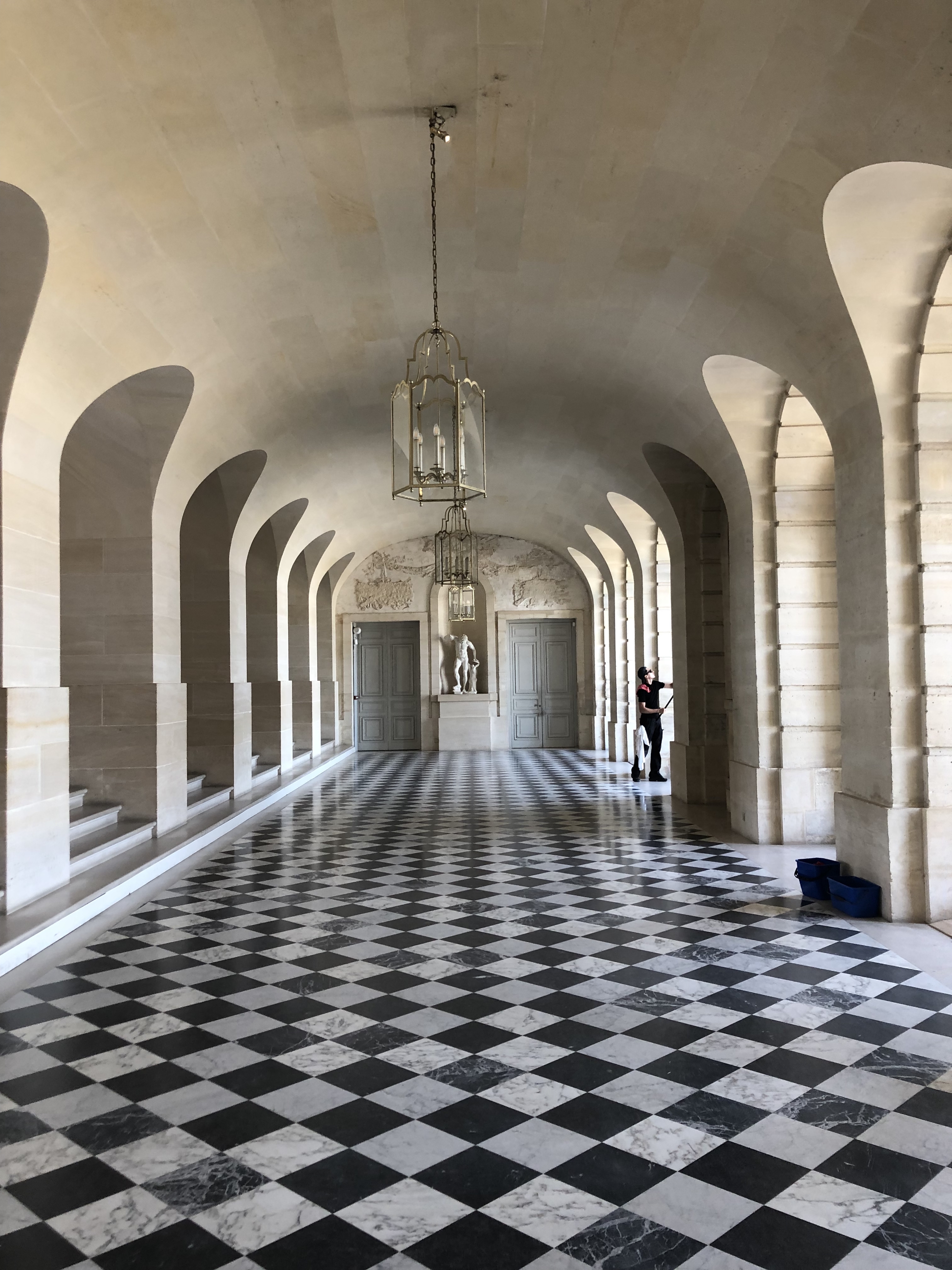 Room inside Versailles with white stone and curvy ceilings