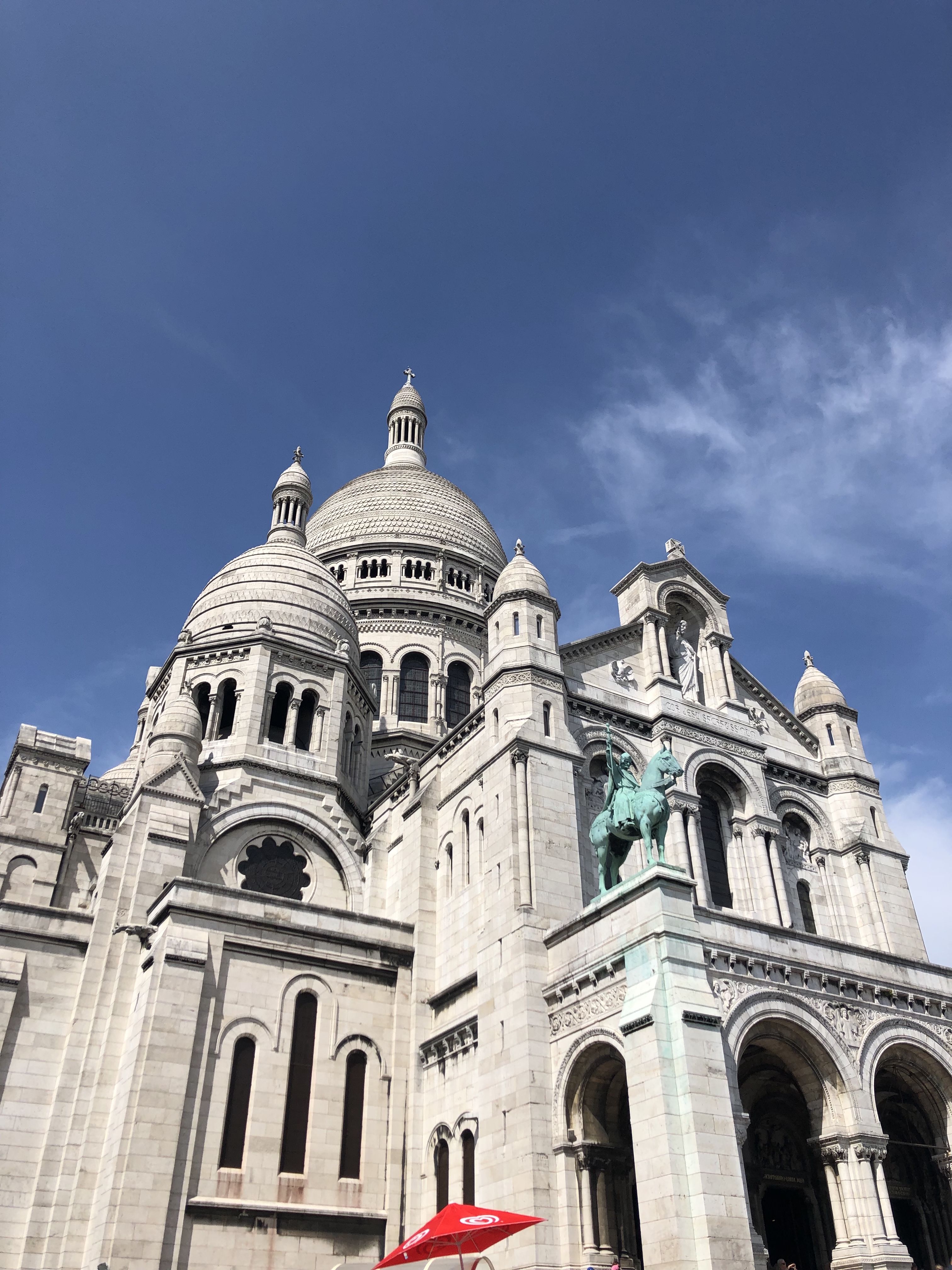 church in montmarte and blue skies