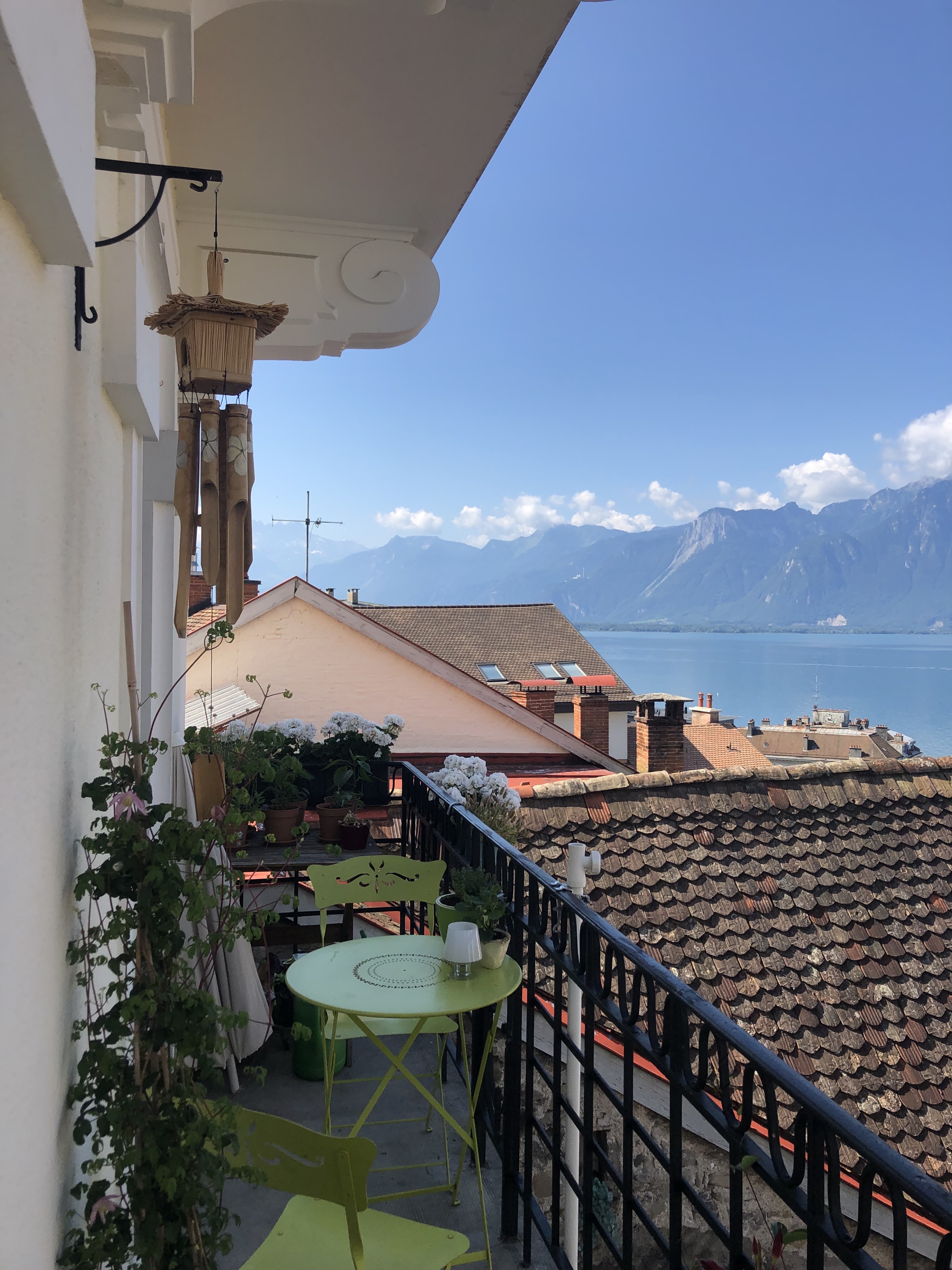 Porch overlooking mountains, lake geneva, and the city of Montreux